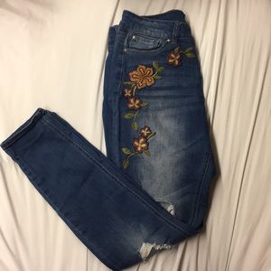 Floral embroidered distressed jeans